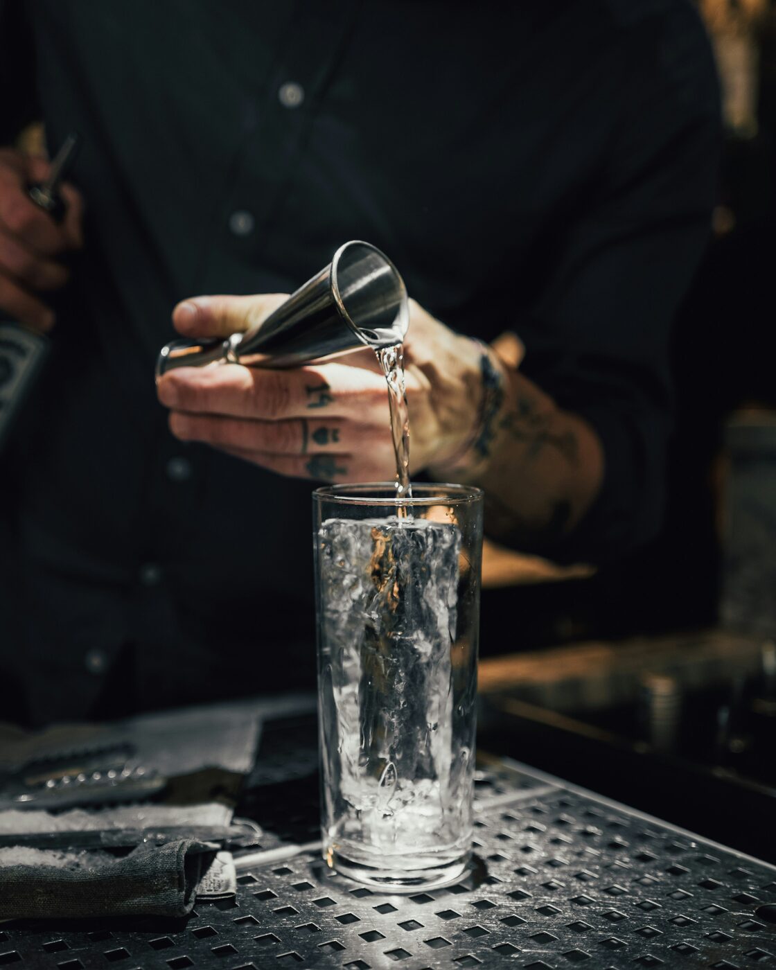 A Blasfemus cocktail being poured in the tasting room