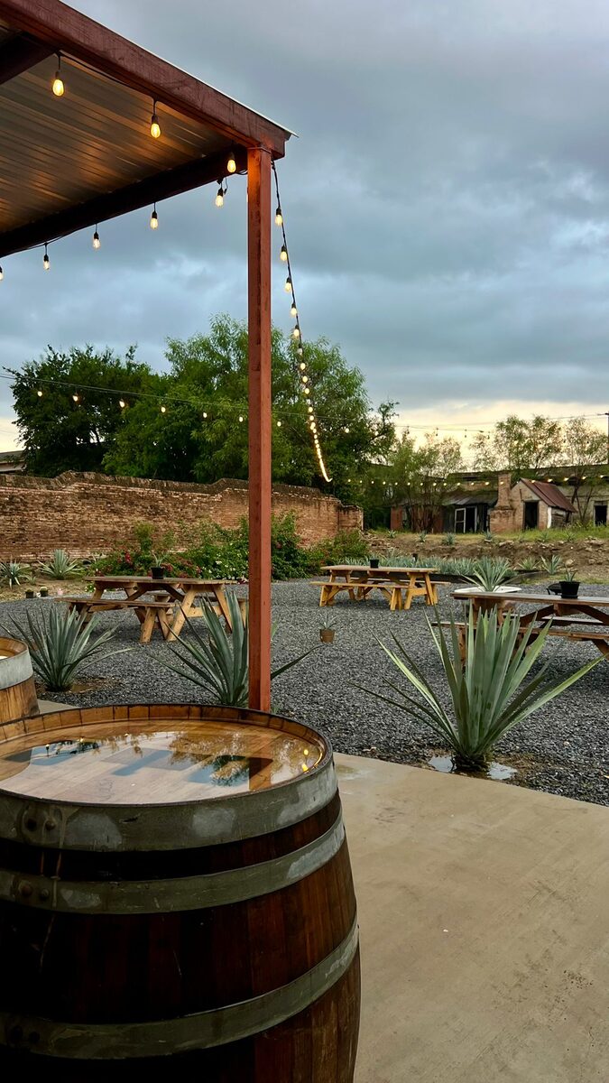 The courtyard at Ancestral Craft Spirits in Roma, Texas