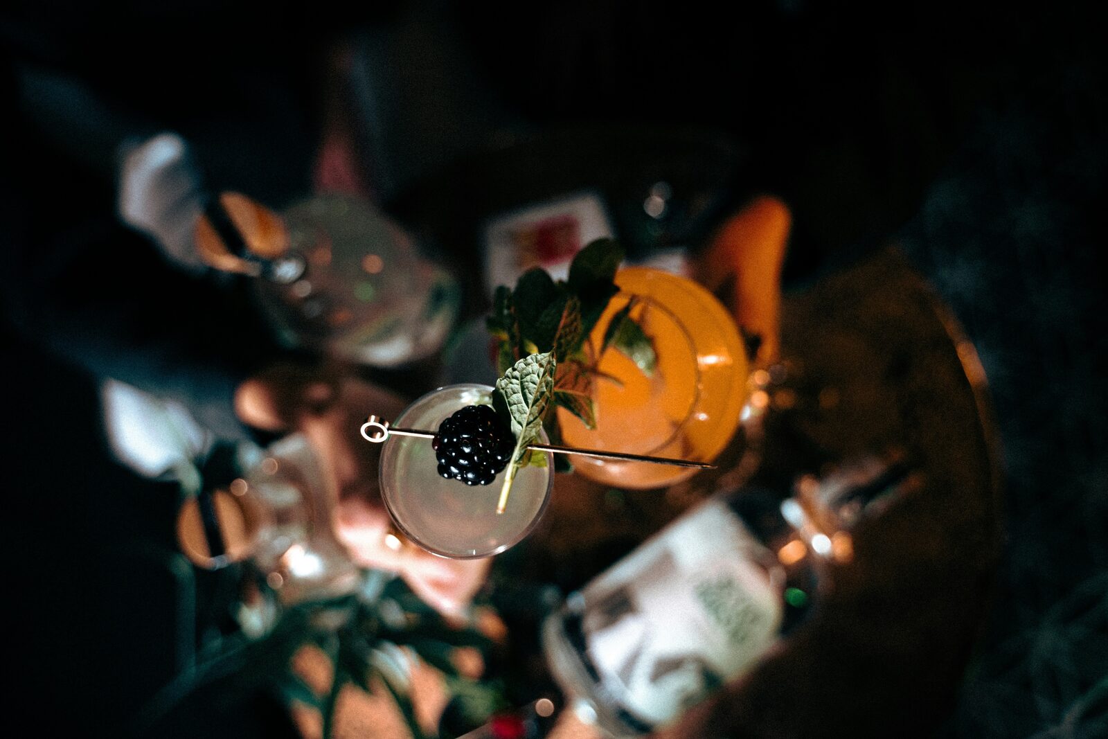 A guest bartender mixing Blasfemus cocktails at the distillery bar