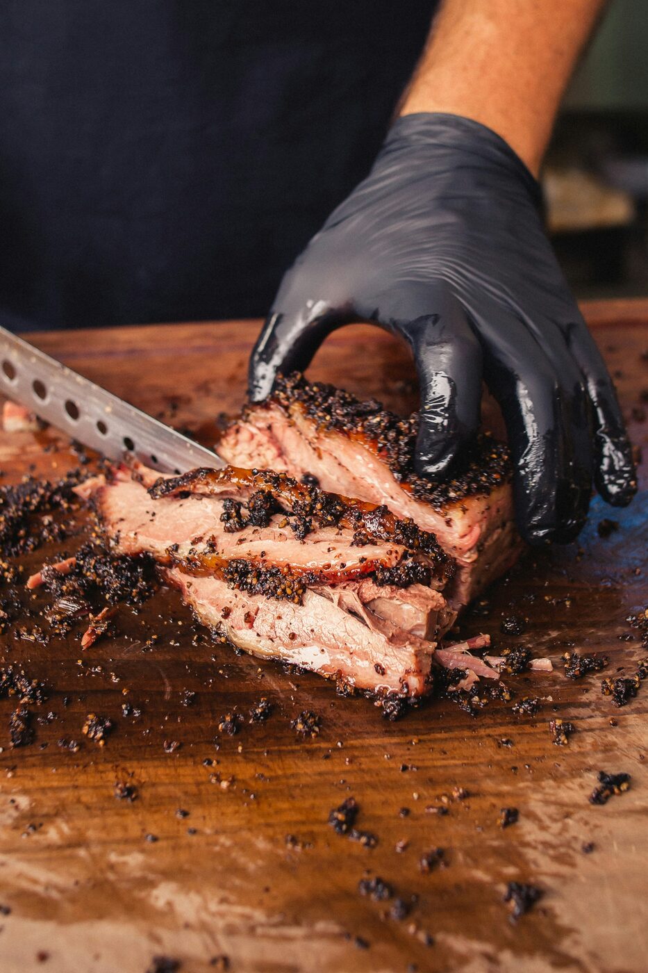 Texas barbecue brisket being sliced at Ancestral Craft Spirits